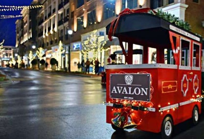 Children's ride Christmas train at shopping center